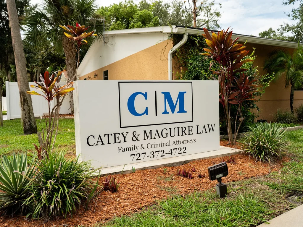 The Catey & Maguire Law sign and office building at 6230 Lafayette St in New Port Richey, Florida