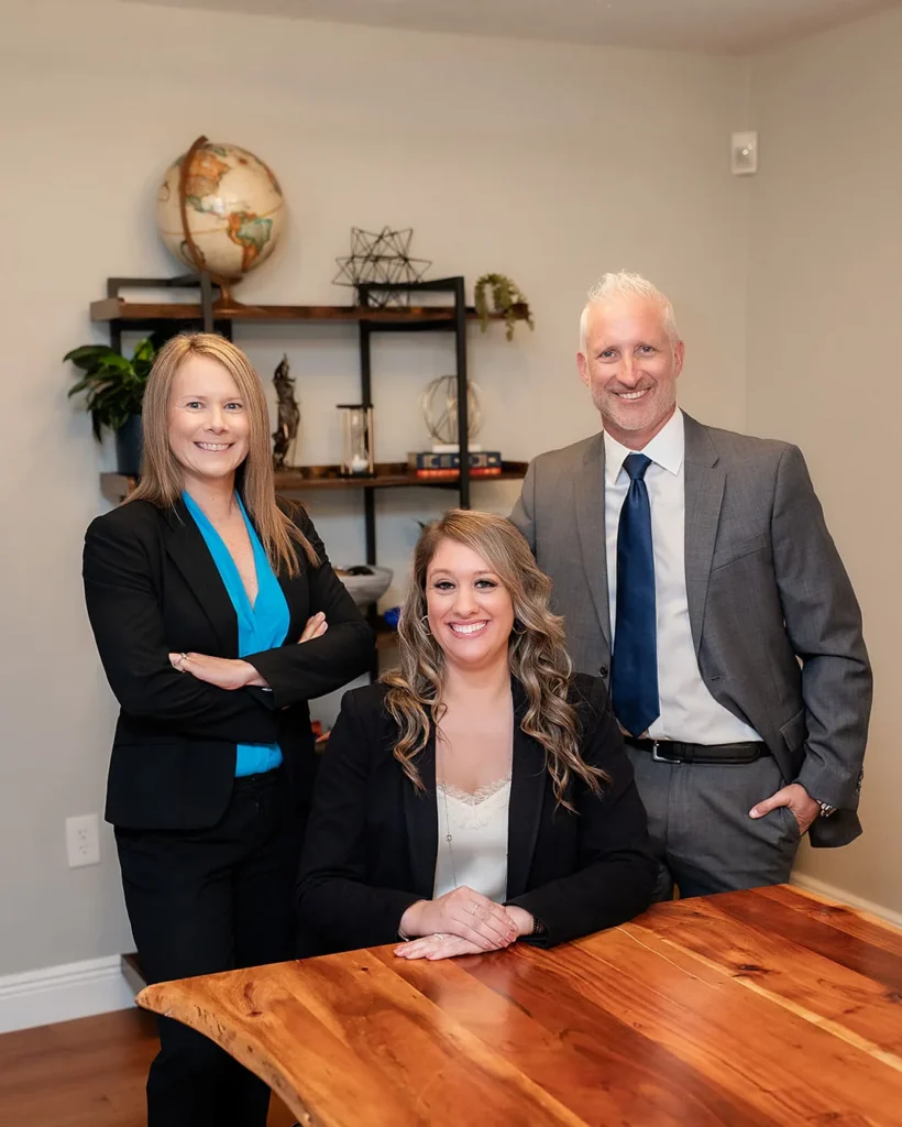 Erin Catey, Lynna Comunale and Jonathan Maguire, family law attorneys at Catey & Maguire Law in New Port Richey, Florida