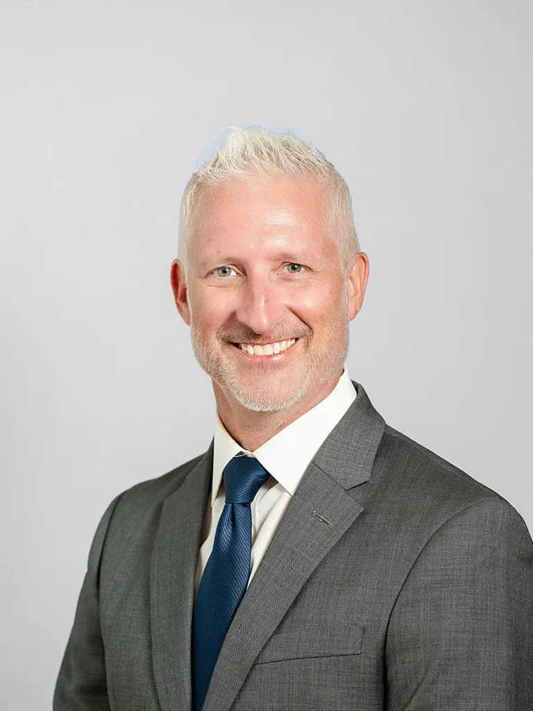 Jonathan Maguire, partner and family law and criminal defense litigation attorney at Catey & Maguire Law in New Port Richey, Florida